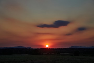 Sunset with distant landscape