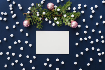 Snowy blue Christmas mockup with fir branch and pink Christmas balls
