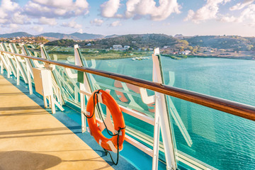 Cruise ship vacation travel Caribbean destination. View of island from boat balcony deck with...