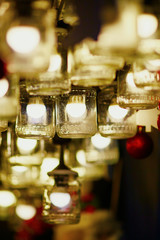 Fototapeta na wymiar Christmas decorations and glass lanterns on a Parisian Christmas market