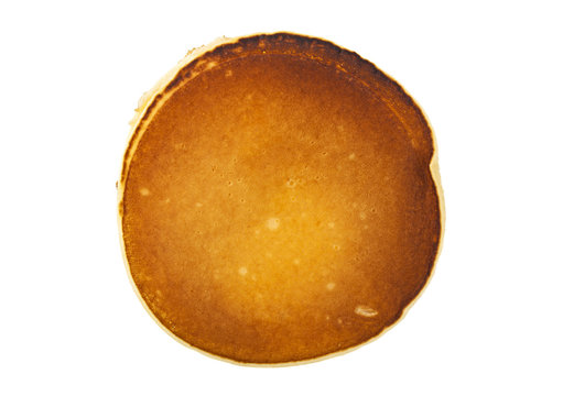 One plain pancakes on a white background, top view