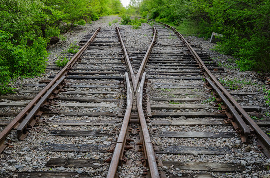 crossing of two old railroad in wood