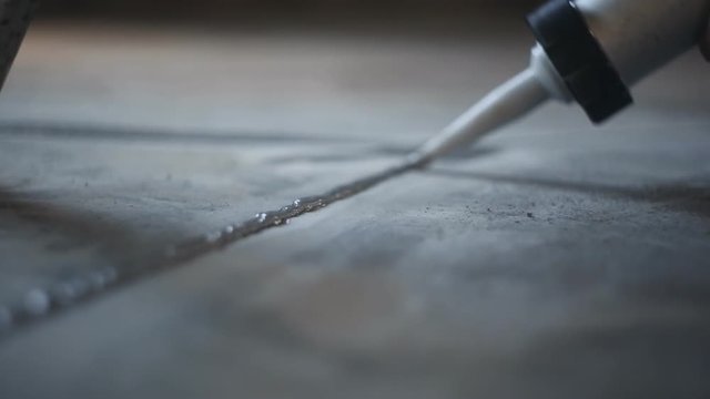 Worker applied adhesive for parquet