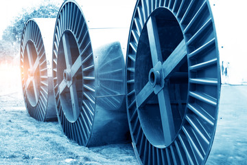 Focus so desiredSteel roller with fiber optic cables for the installation of data cables on a...