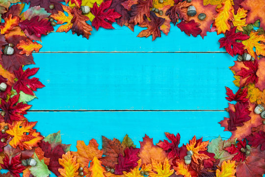 Blank blue sign with colorful fall leaves border