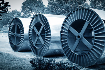 Focus so desiredSteel roller with fiber optic cables for the installation of data cables on a...