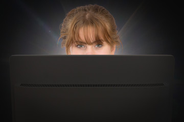 female computer nerd behind the screen