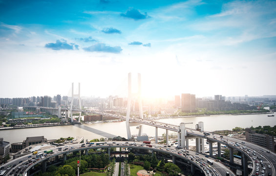 Shanghai Nanpu Bridge At Dusk, Vehicles Motion Blur As Busy Traffic Background