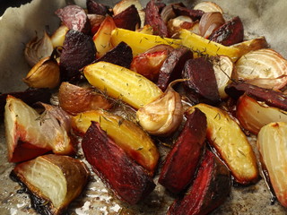 Beetroot and onions baked on a baking sheet