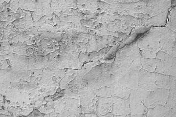 Wall fragment with scratches and cracks