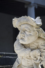 Grotesque dwarf sculpture. Urgnano, Bergamo - Italy