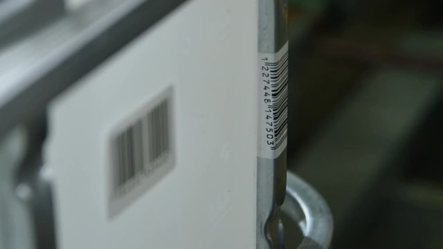 Closeup Barcode Sticker on Intermediate Bulk Container Side