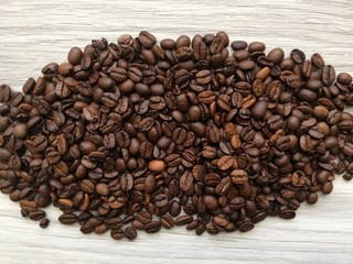 i coffee beans on the wooden floor.background,drink, 