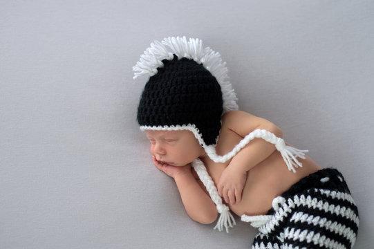 Newborn Baby Boy Wearing a Mohawk Beanie