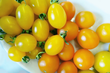 Yellow and orange cherry tomatoes