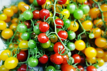 Red, green and yellow cherry tomatoes