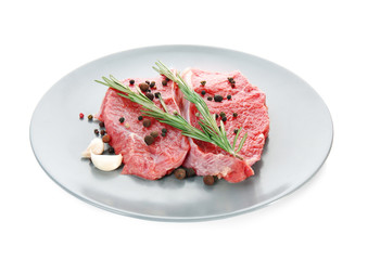 Plate with fresh raw meat, isolated on white
