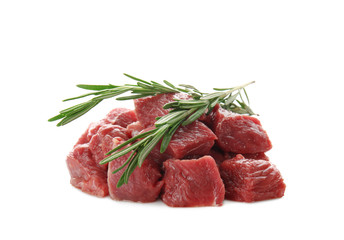 Pieces of fresh raw meat with rosemary on white background