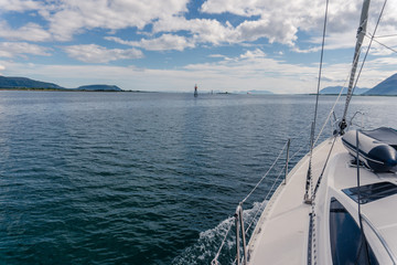 Fototapeta premium Sailing a yacht in Norway