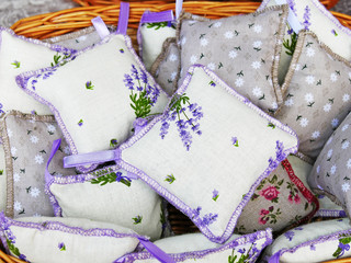 Lavender mini pillows with hanging filled with dry lavender flowers. Handcrafted lavender cotton sachets with crocheted margins.