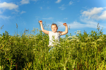 Fototapeta premium Smiling little girl running