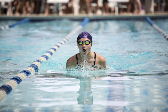 Young female swimmer during a swim meet
