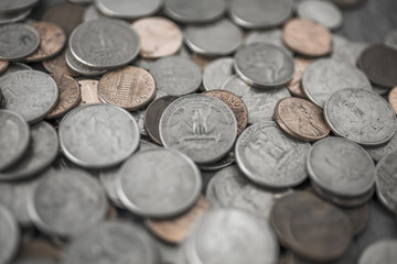 Loose change, pennies, nickels, dimes and quarters