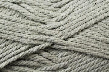 A super close up image of gray yarn