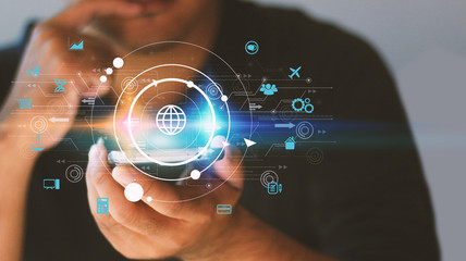 Hand touch screen smart phone, icons interface on screen, Social media, connect to the future concept.