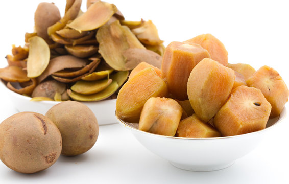 Sapodilla fruits on isolated background.