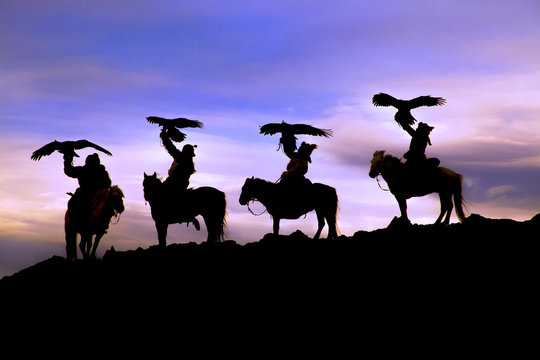 Silhouette Of Mongolian Eagle Hunters, Ulgii, Mongolia