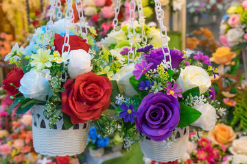 Rose fake flower and Floral background. rose flowers made of fabric. The fabric flowers bouquet. Colorful of decoration artificial flower