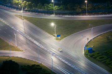 closeup of the light trails on grade separation bridge