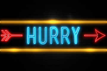 Fototapeta premium Hurry - fluorescent Neon Sign on brickwall Front view
