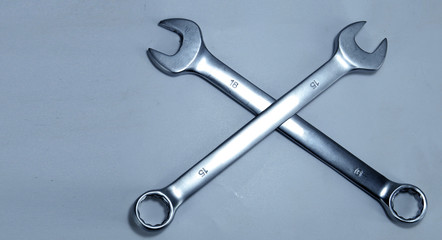 wrench tool on blue tone color background with copy space