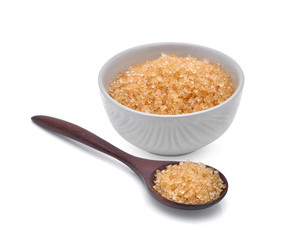 brown cane sugar in wooden spoonn and white cup isolated on white background
