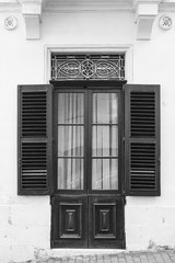 Door with lattice and shutters