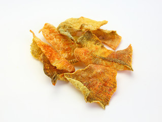 Naklejka premium Crispy fried salmon skin on white background.