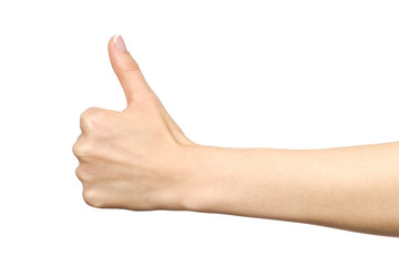 Closeup of female hand showing thumbs up sign