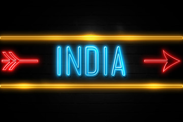 Obraz premium India - fluorescent Neon Sign on brickwall Front view