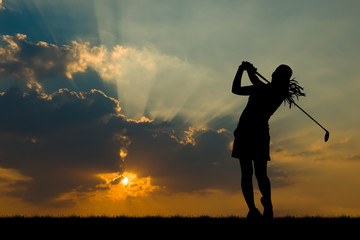 silhouette golfer playing golf during beautiful sunset