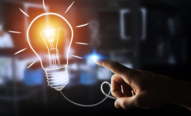 Businesswoman touching a sketch lightbulb