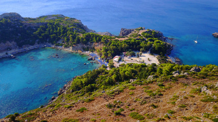 Fototapeta na wymiar August 2017: Aerial drone photo of famous beach of Ladiko near iconic Anthony Quinn Bay, Rodos island, Aegean, Dodecanese, Greece