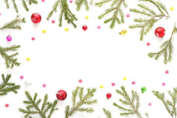 Naklejka na ściany i meble Christmas background. Fir branches isolated on white background. Christmas tree. Christmas toys, snow, fir, rowan in frost, top view. Composition of fir branches, pattern. Christmas frame.