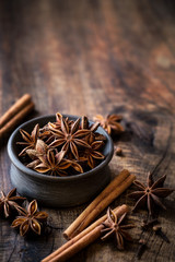 Traditional Christmas spices - star anise, cinnamon sticks and cloves for festive baking