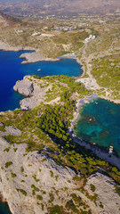 August 2017: Aerial drone photo of famous beach of Ladiko near iconic Anthony Quinn Bay, Rodos island, Aegean, Dodecanese, Greece