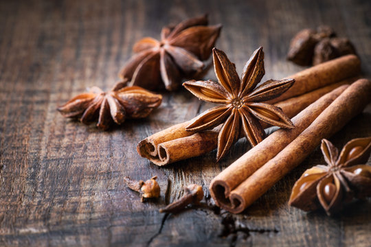 Traditional Christmas spices - star anise, cinnamon sticks and cloves for festive baking - Powered by Adobe