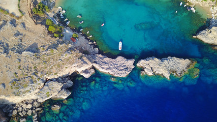 Fototapeta na wymiar Aerial drone photo of famous St.Paul's bay with turquoise waters, Lindos, Rodos island, Aegean, Dodecanese, Greece