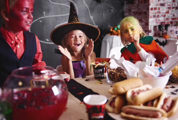 Kids enjoying a meal at carnival © gpointstudio