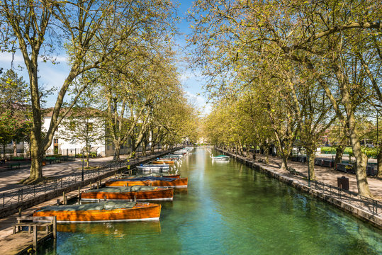 View of river and boat from Pont des Amours (Bridge of Love) in Annecy, France